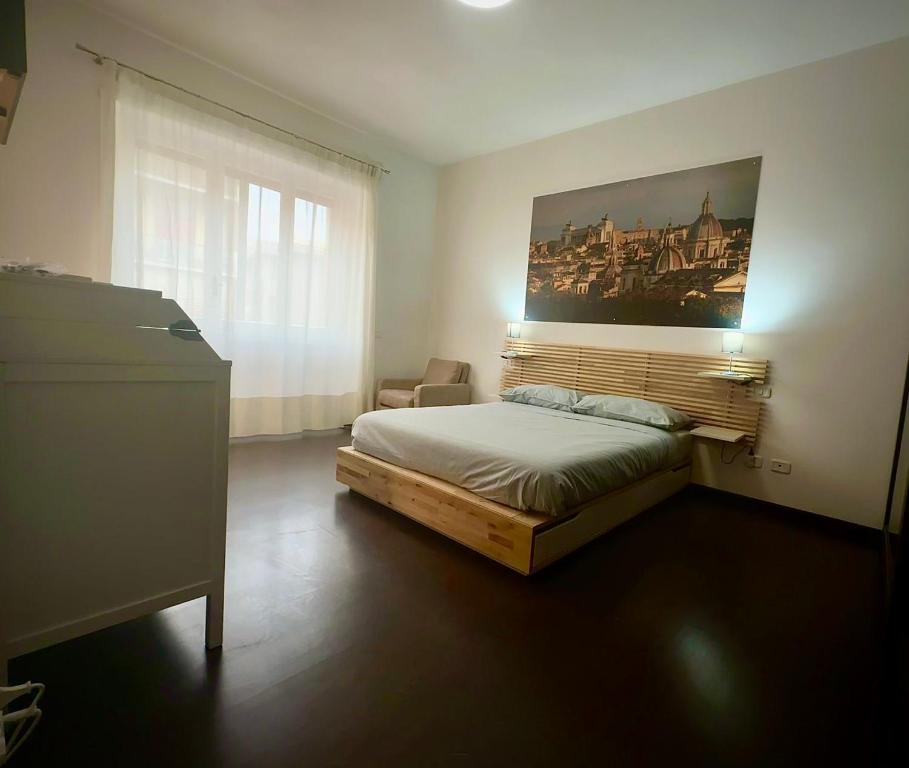 Aniene Guest House — Bedroom with Rome panorama canvas