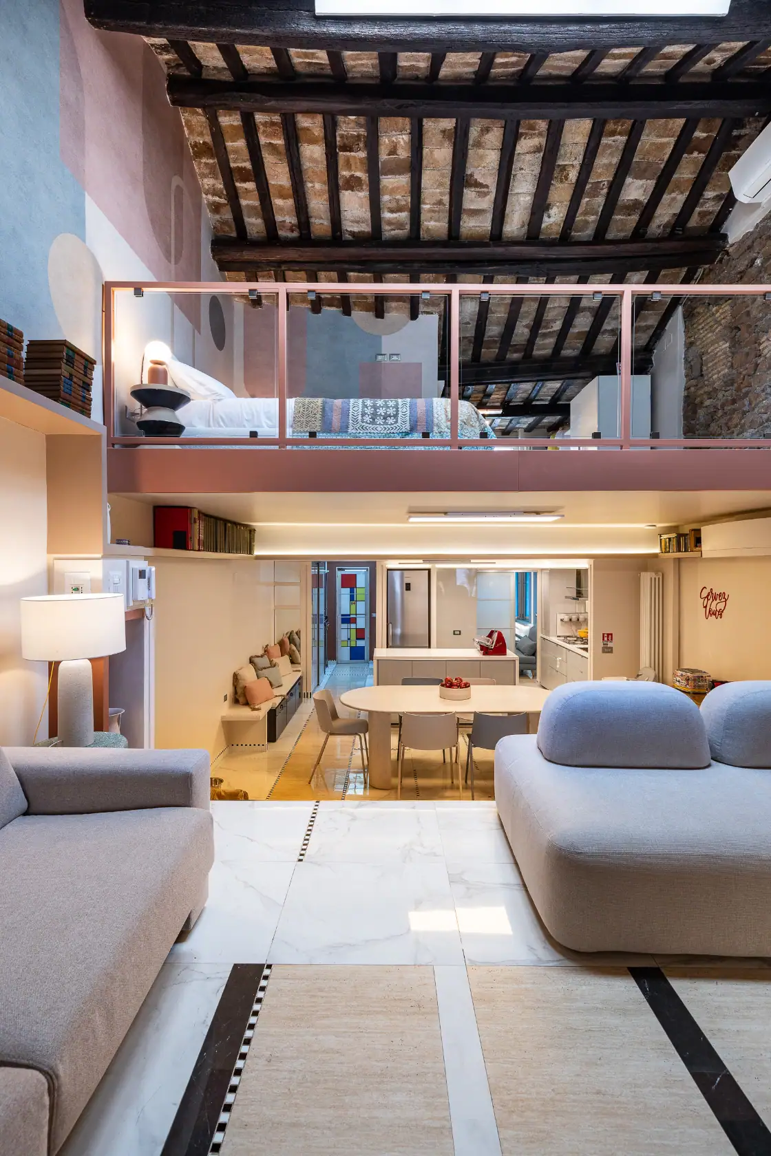 Altiora Luxury Loft – Double-height living room with exposed beams